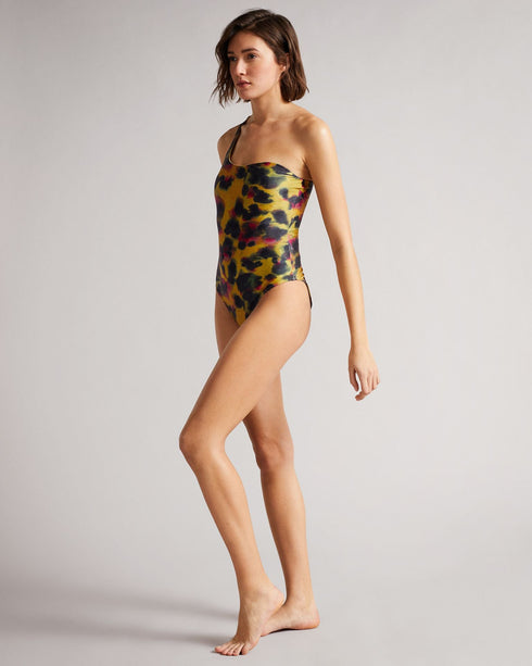 TELSA-Swimwear-Unleash your wild side with our Watercolour Leopard print. TELSA is a must-have for making a lasting impression at the beach, thanks to its striking print and unique one-shoulder style. Ted Baker womenswear collection Swimsuit One shoulder Crossover strap Scooped back cut out Straight neckline Ted Baker branded Mathea is 5'10.5" / 1.79m and wears Brown in a size S- Ted Baker Romania